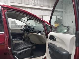 2021 Chrysler Pacifica Hybrid Touring L with VIN 2C4RC1L71MR581260, listed as a IAAI auction lot 42014401 with 68,719 mi miles and . Bid and sale history available at DreamBid. Image 5.