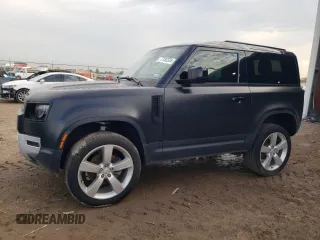 2024 Land Rover Defender S with VIN SALEJ6EX0R2286597, listed as a Copart auction lot 77133334 with 7,894 mi miles and Salvage title. Bid and sale history available at DreamBid. Image 1.