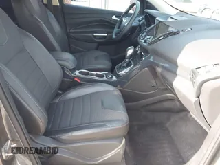 2013 Ford Escape Titanium with VIN 1FMCU0J96DUC31879, listed as a IAAI auction lot 42637019 with 66,096 mi miles and . Bid and sale history available at DreamBid. Image 5.