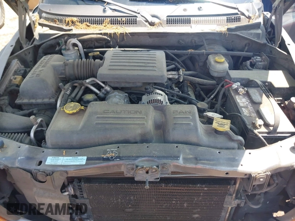 2001 Dodge Dakota Sport z VIN 1B7HL2ANX1S297770, wystawiony jako IAAI lot #42309715 z przebiegiem 279 458 mil mil oraz . Historia ofert i sprzedaży dostępna na DreamBid. Obrazek 10.