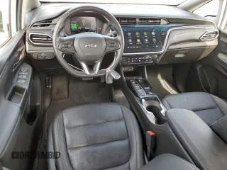 2023 Chevrolet Bolt EV 2LT with VIN 1G1FX6S04P4122510, listed as a Copart auction lot 60584705 with 12,291 mi miles and Salvage title. Bid and sale history available at DreamBid. Image 8.