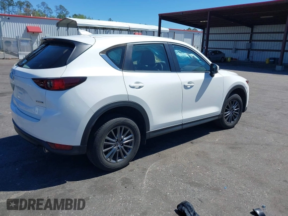 2020 Mazda CX-5 Sport with VIN JM3KFABM9L0828959, listed as a IAAI auction lot 41814085 with 15,344 mi miles. Bid and sale history available at carsss.com. Image 4.