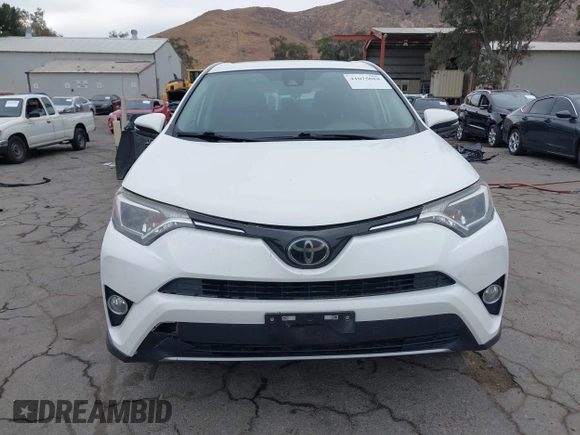 2018 Toyota RAV4 XLE with VIN JTMWFREV7JJ730811, listed as a IAAI auction lot 41075088 with 78,979 mi miles. Bid and sale history available at carsss.com. Image 12.