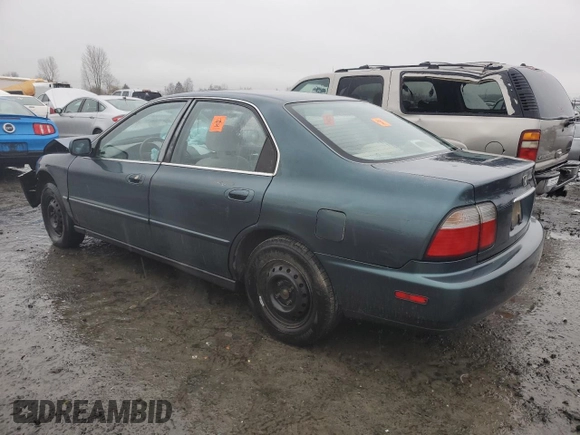 1996 Honda Accord Value with VIN 1HGCD5693TA266021, listed as a Copart auction lot 86699844 with 237,152 mi miles and Salvage Title. Bid and sale history available at DreamBid. Image 2.