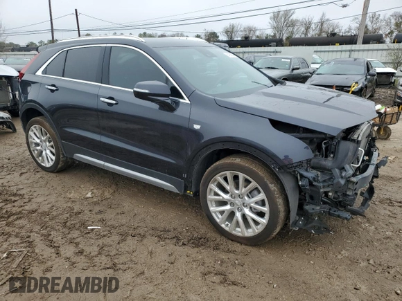 2022 Cadillac XT4 AWD Premium Luxury with VIN 1GYFZDR42NF147920, listed as a Copart auction lot 84058554 with 12,145 mi miles and Salvage Title. Bid and sale history available at carsss.com. Image 4.
