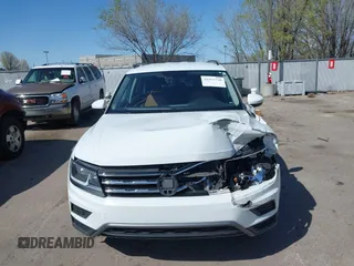2019 Volkswagen Tiguan SE with VIN 3VV2B7AX8KM193166, listed as a IAAI auction lot 41957720 with 61,981 mi miles and . Bid and sale history available at DreamBid. Image 12.