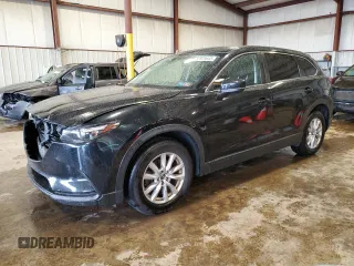 2016 Mazda CX-9 Sport с VIN JM3TCBBY2G0118068, выставлен на аукционе Copart как лот 57879565 с пробегом 77 088 миль миль и Списание • Salvage title. История ставок и продаж доступна на DreamBid. Изображение 1.