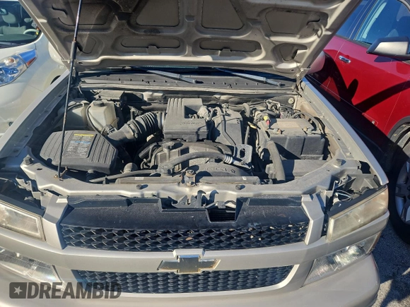 2009 Chevrolet Colorado Work Truck z VIN 1GCCS19E198127785, wystawiony jako Copart lot #85679794 z przebiegiem 167 149 mil mil oraz Czysty tytuł • Clean title. Historia ofert i sprzedaży dostępna na DreamBid. Obrazek 7.