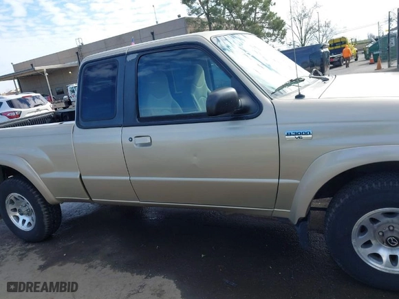 2002 Mazda B-Series 2WD Truck DS with VIN 4F4YR16U52TM18118, listed as a IAAI auction lot 41563022 with 126,136 mi miles. Bid and sale history available at carsss.com. Image 13.
