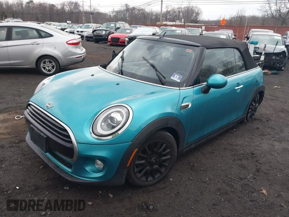 2019 MINI Convertible Cooper with VIN WMWWG5C52K3H08648, listed as a IAAI auction lot 41686314 with 40,728 mi miles and . Bid and sale history available at DreamBid. Image 2.