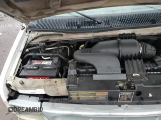 2001 Ford Econoline Cargo z VIN 1FTRE142X1HB27593, wystawiony jako Copart lot #83827154 z przebiegiem 190 761 mil mil oraz Szkoda całkowita • Salvage title. Historia ofert i sprzedaży dostępna na DreamBid. Obrazek 13.