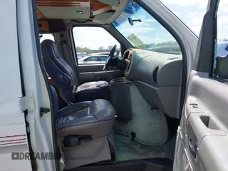 1999 Ford Econoline Cargo Recreational with VIN 1FDRE14L2XHA41059, listed as a IAAI auction lot 42067879 with 149,185 mi miles. Bid and sale history available at carsss.com. Image 5.