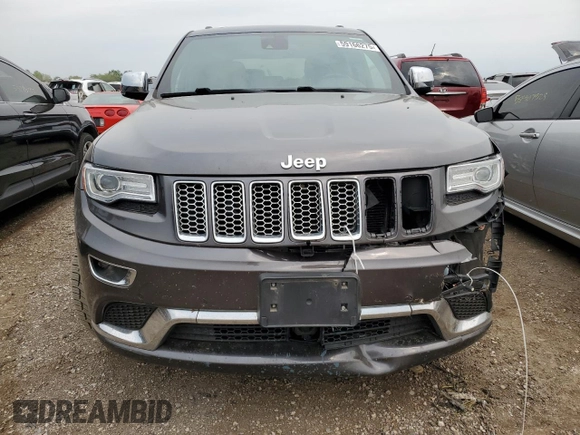 2014 Jeep Grand Cherokee Summit с VIN 1C4RJFJG6EC500348, выставлен на аукционе Copart как лот 59166275 с пробегом 104 623 миль миль и Списание • Salvage title. История ставок и продаж доступна на DreamBid. Изображение 5.