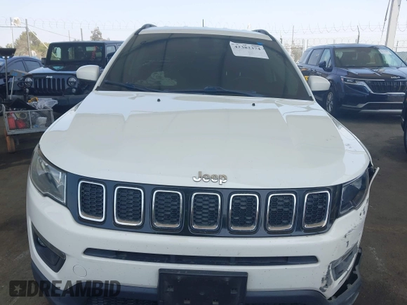 2020 Jeep Compass Latitude with VIN 3C4NJCBB8LT141375, listed as a IAAI auction lot 42382374 with 63,799 mi miles and . Bid and sale history available at DreamBid. Image 13.