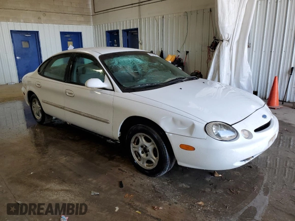 1997 Ford Taurus GL z VIN 1FALP52U5VA148108, wystawiony jako Copart lot #48343435 z przebiegiem 153 082 mil mil oraz Szkody całkowita. Historia ofert i sprzedaży dostępna na DreamBid. Obrazek 4.