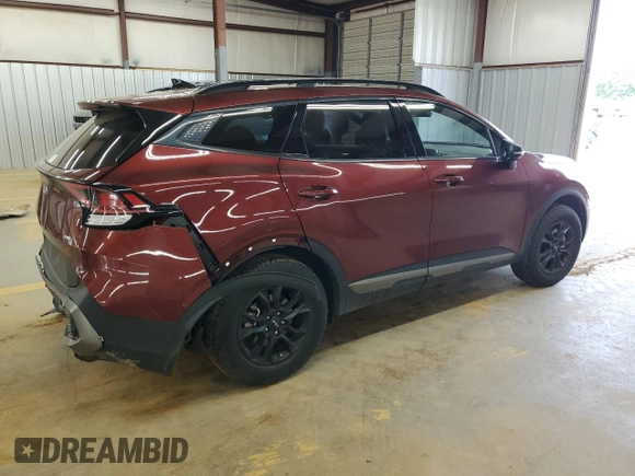 2023 Kia Sportage X-Pro z VIN 5XYK7CAF6PG137375, wystawiony jako Copart lot #57382485 z przebiegiem 27 244 mil mil oraz Szkoda całkowita • Salvage title. Historia ofert i sprzedaży dostępna na DreamBid. Obrazek 3.
