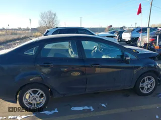 2017 Ford Fiesta SE z VIN 3FADP4BJ6HM125903, wystawiony jako IAAI lot #41376018 z przebiegiem 114 628 mil mil oraz . Historia ofert i sprzedaży dostępna na DreamBid. Obrazek 13.