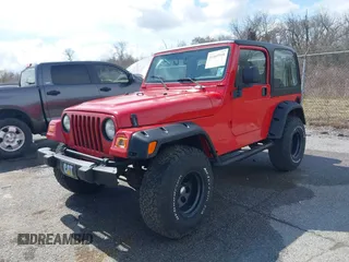 2002 Jeep Wrangler X with VIN 1J4FA39S02P739211, listed as a IAAI auction lot 41665910 with 144,118 mi miles. Bid and sale history available at carsss.com. Image 2.