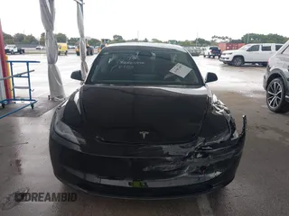 2024 Tesla Model 3 with VIN 5YJ3E1EA6RF731312, listed as a IAAI auction lot 41987407 with 5,025 mi miles and . Bid and sale history available at DreamBid. Image 12.