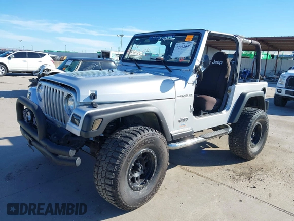 2002 Jeep Wrangler X with VIN 1J4FA39S42P763835, listed as a IAAI auction lot 42302645 with 233,634 mi miles and . Bid and sale history available at DreamBid. Image 21.
