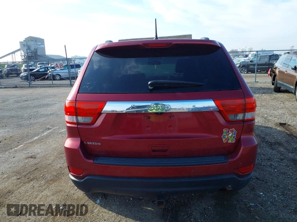 2013 Jeep Grand Cherokee Laredo with VIN 1C4RJEAG9DC538259, listed as a IAAI auction lot 41832676 with 143,000 mi miles. Bid and sale history available at carsss.com. Image 16.