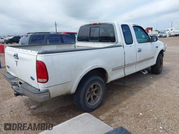 1997 Ford F-150 XL z VIN 1FTEX18L0VNB99499, wystawiony jako IAAI lot #42163584 z przebiegiem 242 946 mil mil oraz . Historia ofert i sprzedaży dostępna na DreamBid. Obrazek 4.