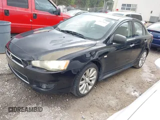 2011 Mitsubishi Lancer GTS with VIN JA32U8FW0BU005510, listed as a IAAI auction lot 41678936 with 204,511 mi miles. Bid and sale history available at carsss.com. Image 2.