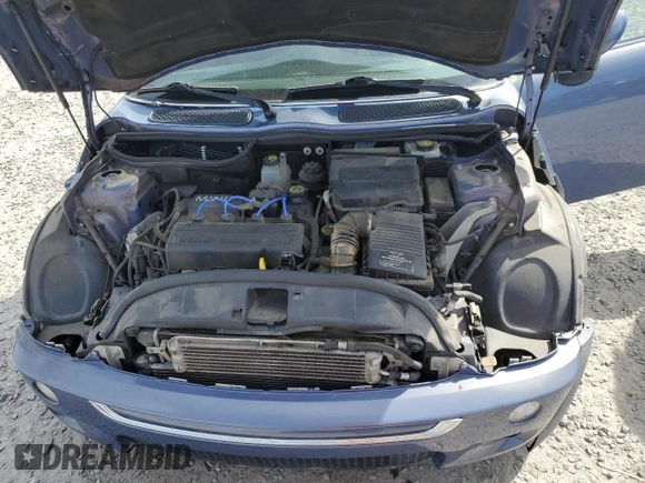 2007 MINI Convertible с VIN WMWRF335X7TG17414, выставлен на аукционе Copart как лот 47640925 с пробегом 149 906 миль миль и Списание • Salvage title. История ставок и продаж доступна на DreamBid. Изображение 11.