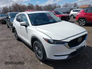 2019 Mazda CX-5 Touring with VIN JM3KFBCMXK0595905, listed as a IAAI auction lot 41934373 with 83,020 mi miles. Bid and sale history available at carsss.com. Image 1.