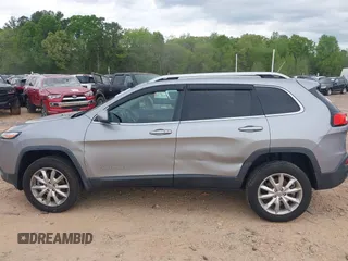 2015 Jeep Cherokee Limited with VIN 1C4PJMDS3FW706058, listed as a IAAI auction lot 41951302 with 163,404 mi miles. Bid and sale history available at carsss.com. Image 14.