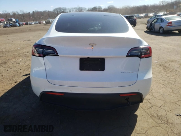 2021 Tesla Model Y Long Range with VIN 5YJYGDEE5MF118045, listed as a Copart auction lot 50790065 with 43,704 mi miles and Salvage Title. Bid and sale history available at DreamBid. Image 6.