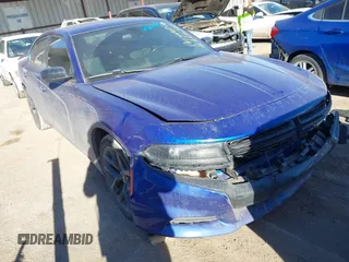 2019 Dodge Charger SXT with VIN 2C3CDXBG0KH588294, listed as a IAAI auction lot 41666566 with 113,874 mi miles. Bid and sale history available at carsss.com. Image 1.