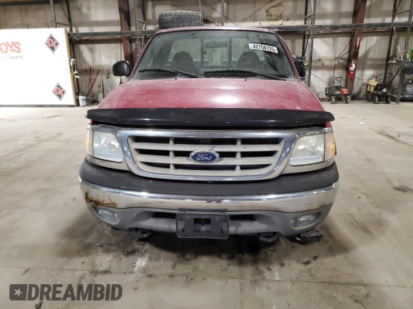 2003 Ford F-150 XL z VIN 2FTRF18W93CB06996, wystawiony jako Copart lot #42758725 z przebiegiem 142 428 mil mil oraz Szkoda całkowita • Salvage title. Historia ofert i sprzedaży dostępna na DreamBid. Obrazek 5.
