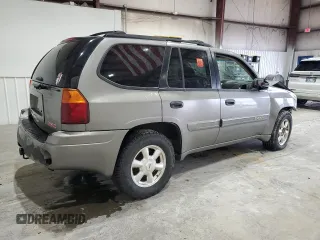 2005 GMC Envoy SLE с VIN 1GKDS13S752274178, выставлен на аукционе Copart как лот 55289005 с пробегом 199 378 миль миль и Списание • Salvage title. История ставок и продаж доступна на DreamBid. Изображение 3.