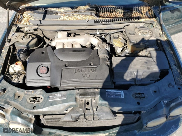 2002 Jaguar X-Type with VIN SAJEA51C12WC33477, listed as a Copart auction lot 83711124 with 165,637 mi miles and Salvage Title. Bid and sale history available at carsss.com. Image 11.
