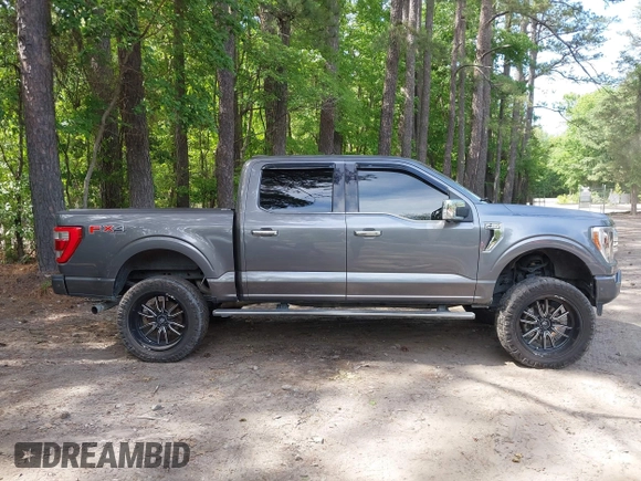 2021 Ford F-150 XL with VIN 1FTFW1E87MFC59701, listed as a IAAI auction lot 42288926 with Not provided miles and . Bid and sale history available at DreamBid. Image 13.