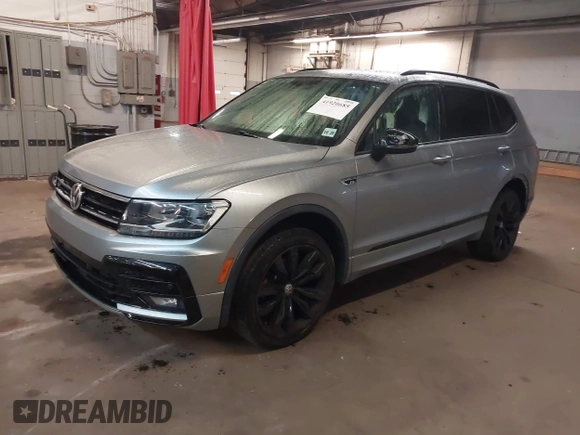 2020 Volkswagen Tiguan SE with VIN 3VV2B7AX5LM149305, listed as a IAAI auction lot 41920685 with 30,512 mi miles and . Bid and sale history available at DreamBid. Image 2.
