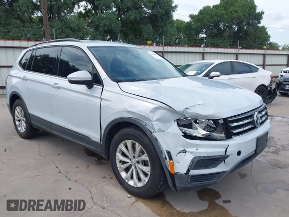 2018 Volkswagen Tiguan S with VIN 3VV1B7AX0JM092116, listed as a IAAI auction lot 42388339 with 103,412 mi miles and . Bid and sale history available at DreamBid. Image 1.