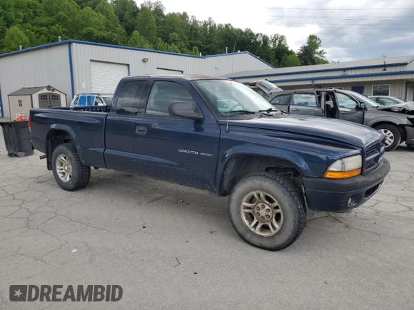 2002 Dodge Dakota z VIN 1B7GG32X32S546515, wystawiony jako Copart lot #57888695 z przebiegiem 81 202 mil mil oraz Szkoda całkowita • Salvage title. Historia ofert i sprzedaży dostępna na DreamBid. Obrazek 4.