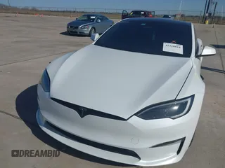 2022 Tesla Model S Plaid with VIN 5YJSA1E69NF486471, listed as a IAAI auction lot 41228818 with 49,207 mi miles and . Bid and sale history available at carsss.com. Image 6.
