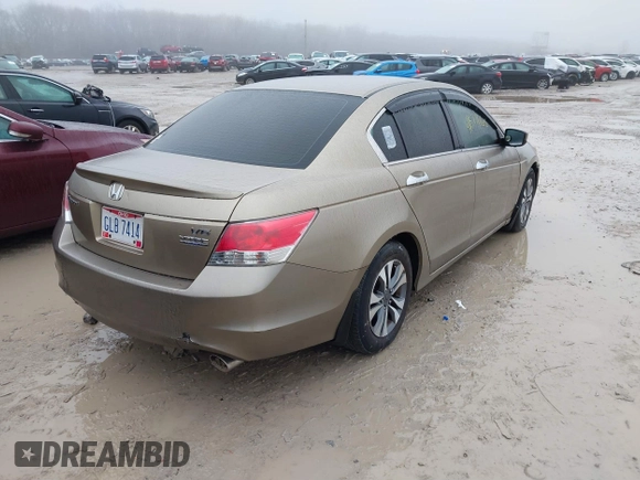 2010 Honda Accord EX z VIN 5KBCP3F73AB004739, wystawiony jako IAAI lot #41527668 z przebiegiem 206 667 mil mil oraz . Historia ofert i sprzedaży dostępna na DreamBid. Obrazek 4.