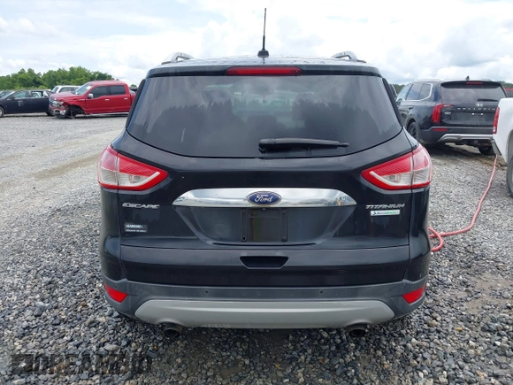 2015 Ford Escape Titanium с VIN 1FMCU0JXXFUB10676, выставлен на аукционе IAAI как лот 42412073 с пробегом 129 737 миль миль и . История ставок и продаж доступна на DreamBid. Изображение 16.
