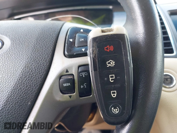 2015 Ford Taurus SEL with VIN 1FAHP2E82FG201994, listed as a IAAI auction lot 42750171 with 228,873 mi miles and . Bid and sale history available at DreamBid. Image 11.