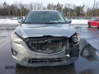 2014 Mazda CX-5 Grand Touring with VIN JM3KE2DY8E0304911, listed as a IAAI auction lot 41672197 with 77,523 mi miles. Bid and sale history available at carsss.com. Image 12.