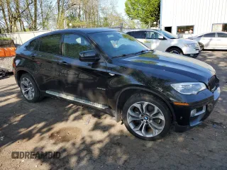 2013 BMW X6 xDrive50i z VIN 5UXFG8C5XDL591761, wystawiony jako Copart lot #54182645 z przebiegiem 117 250 mil mil oraz Szkoda całkowita • Salvage title. Historia ofert i sprzedaży dostępna na DreamBid. Obrazek 4.