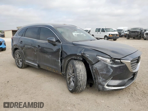 2018 Mazda CX-9 Signature with VIN JM3TCBEY3J0212172, listed as a Copart auction lot 57100485 with 95,353 mi miles and Salvage title. Bid and sale history available at DreamBid. Image 4.