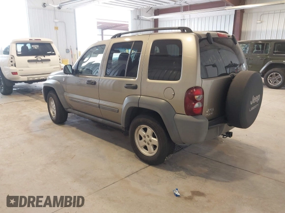 2005 Jeep Liberty Sport with VIN 1J4GL48K85W717487, listed as a IAAI auction lot 42082744 with 103,888 mi miles. Bid and sale history available at carsss.com. Image 3.