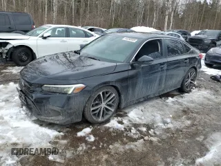 2023 Honda Civic Sedan Touring with VIN 2HGFE1F96PH001880, listed as a Copart auction lot 44256955 with 36,223 mi miles and Clean Title. Bid and sale history available at carsss.com. Image 1.