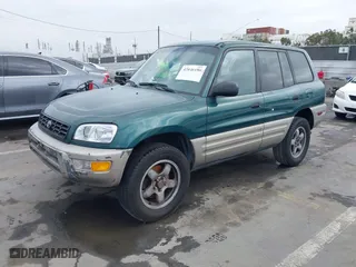 1998 Toyota RAV4 with VIN JT3GP10V9W7032820, listed as a IAAI auction lot 42046186 with 312,888 mi miles. Bid and sale history available at carsss.com. Image 2.