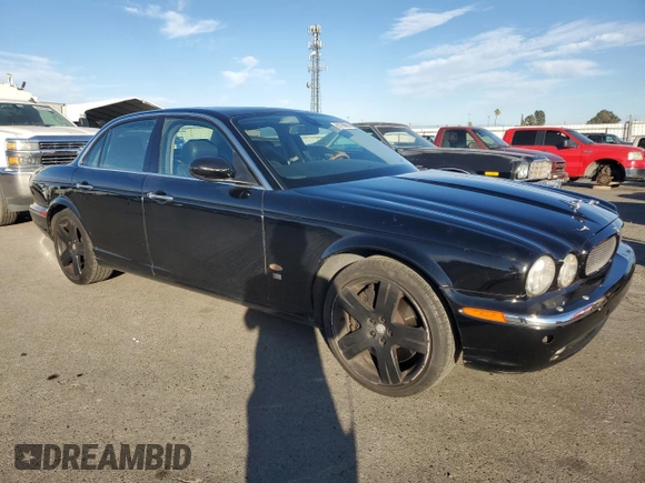 2006 Jaguar XJ with VIN SAJWA73C26TH03133, listed as a Copart auction lot 81796674 with 128,006 mi miles and Non repairable. Bid and sale history available at DreamBid. Image 4.